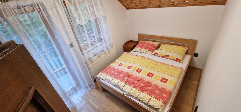 Posteľ alebo postele v izbe v ubytovaní Horská chata Zubor