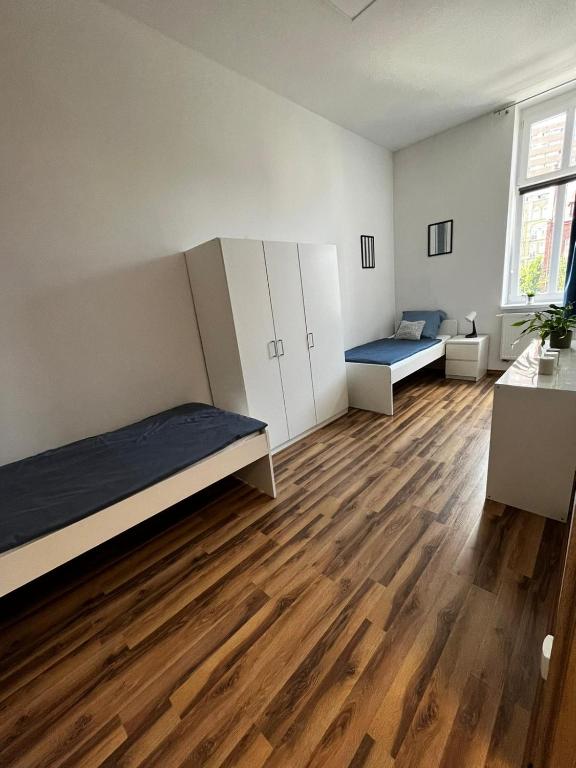 Posteľ alebo postele v izbe v ubytovaní Kamienica4
