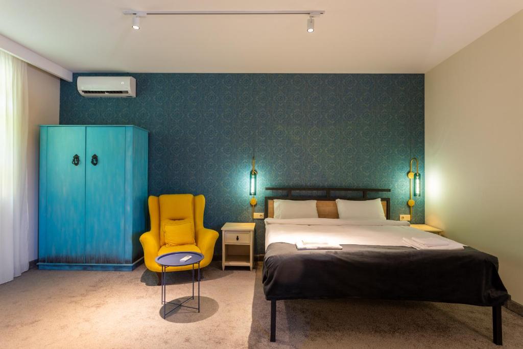 Postel nebo postele na pokoji v ubytování Betlemi Hotel