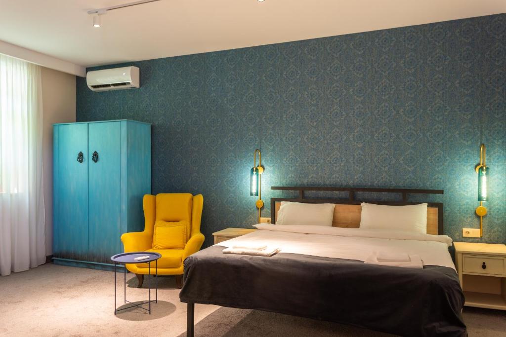 Postel nebo postele na pokoji v ubytování Betlemi Hotel