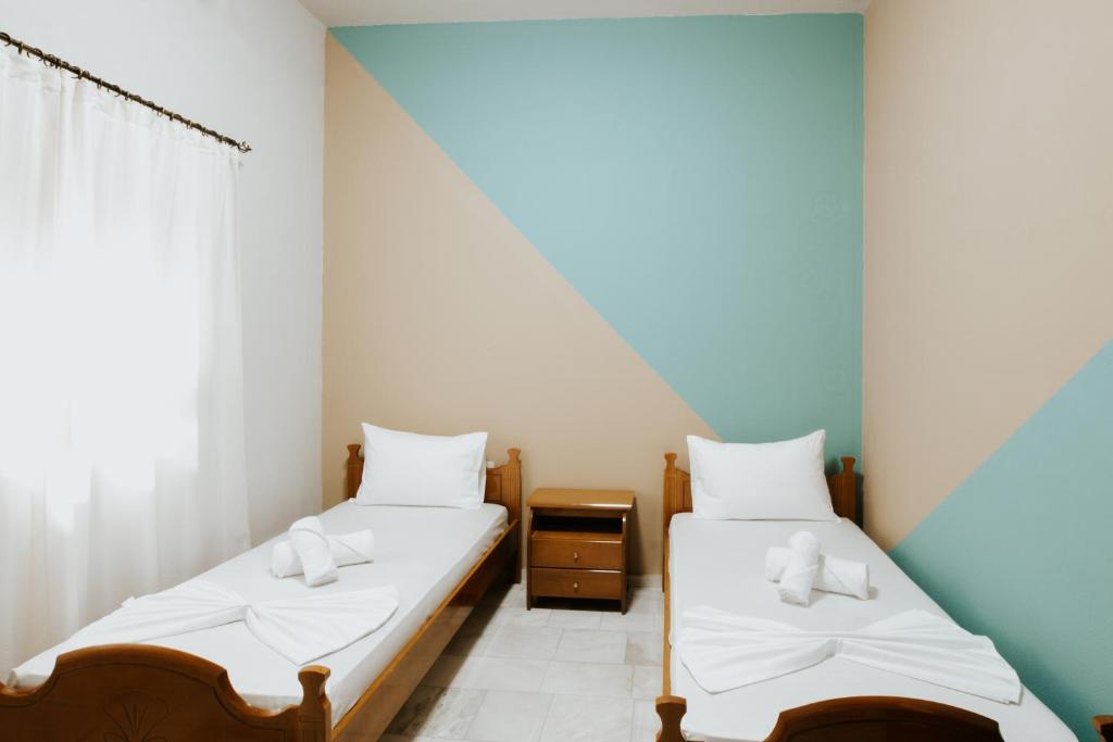 Postel nebo postele na pokoji v ubytování HOTEL LUNXHERIA