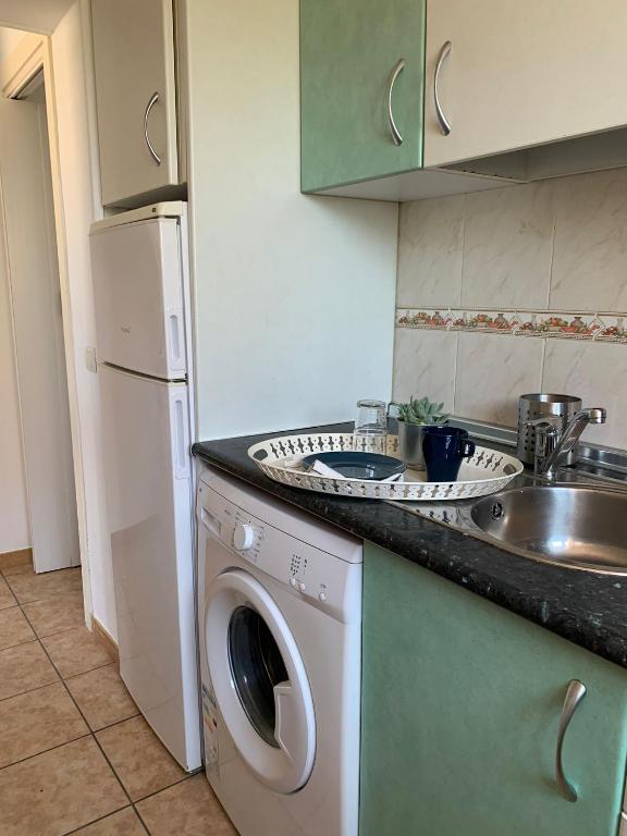 Kuchyň nebo kuchyňský kout v ubytování Apartamento El Cantal