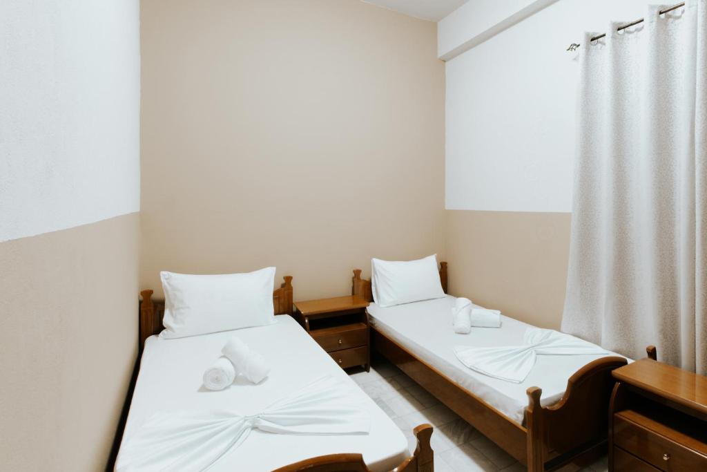 Postel nebo postele na pokoji v ubytování HOTEL LUNXHERIA