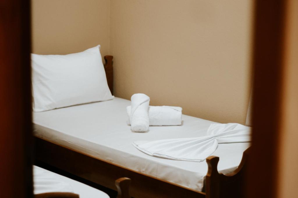 Postel nebo postele na pokoji v ubytování HOTEL LUNXHERIA