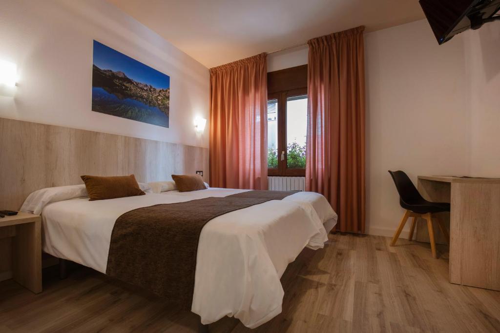 Кровать или кровати в номере Hotel Marco Polo