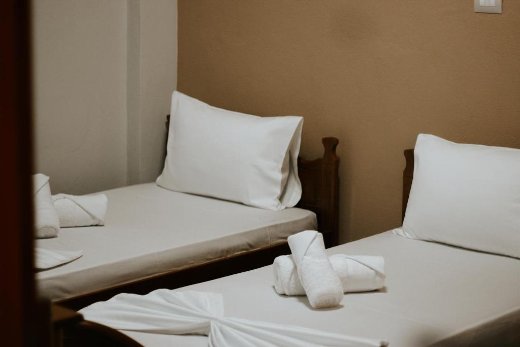 Postel nebo postele na pokoji v ubytování HOTEL LUNXHERIA