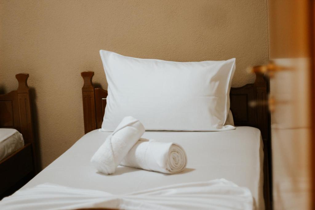 Postel nebo postele na pokoji v ubytování HOTEL LUNXHERIA