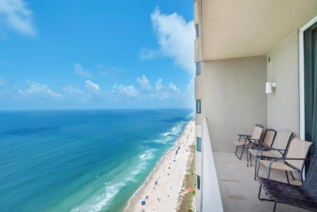 a balcony view of the ocean from a hotel at Tidewater 2804 in Panama City Beach