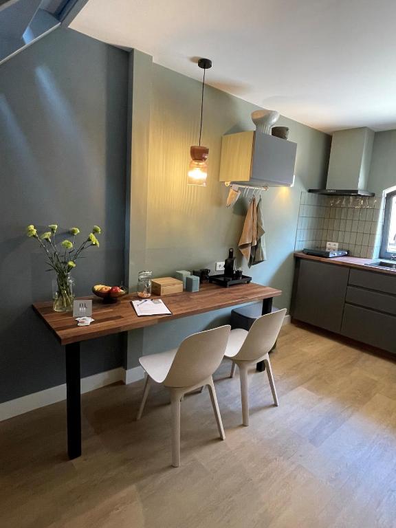 Kuchyň nebo kuchyňský kout v ubytování B&B De Meije