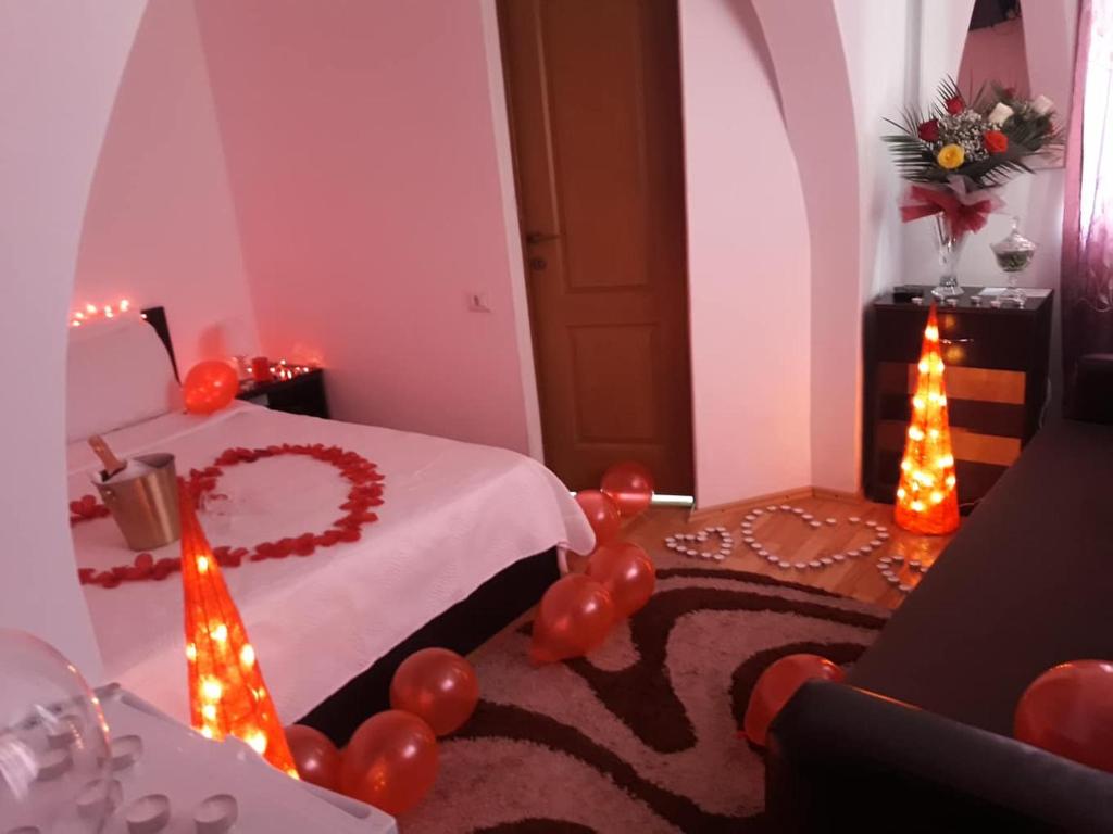 Postel nebo postele na pokoji v ubytování Pensiunea Aurelia
