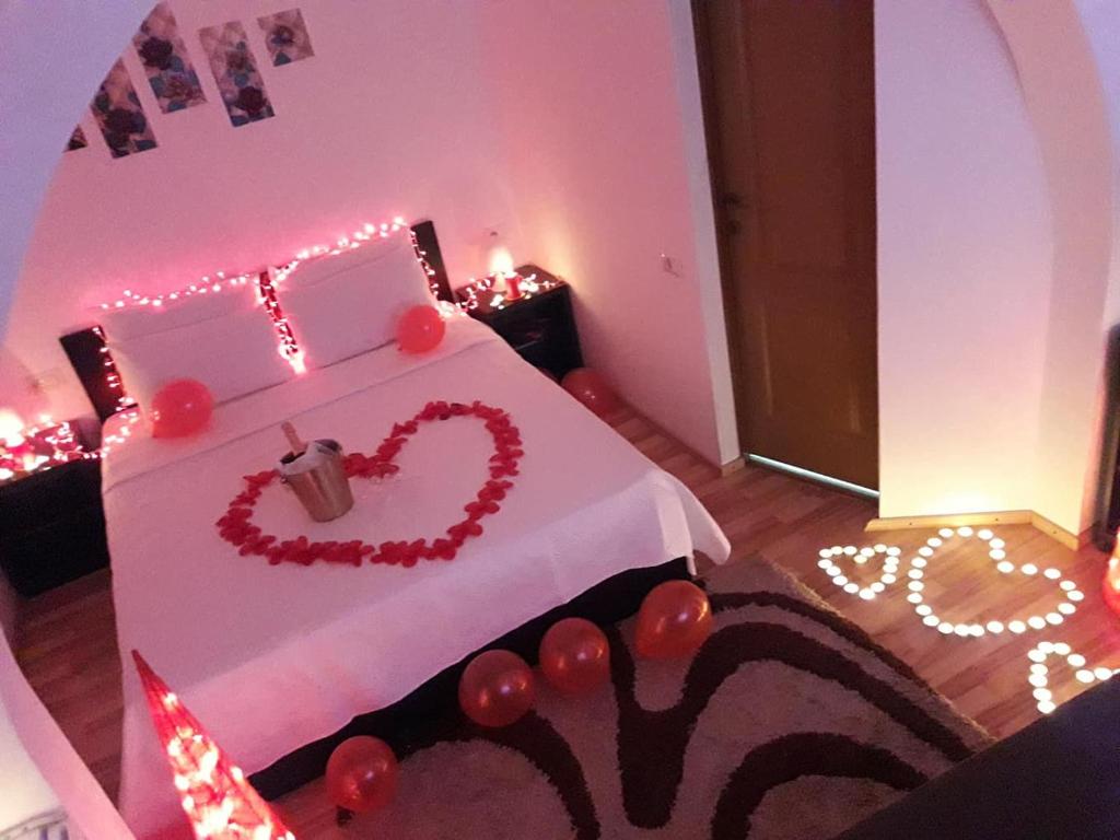 Postel nebo postele na pokoji v ubytování Pensiunea Aurelia