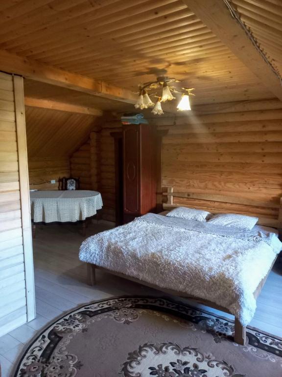 Postel nebo postele na pokoji v ubytování Фазенда "Змерега"