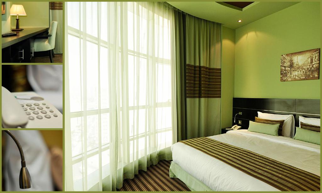Postel nebo postele na pokoji v ubytování Aldar Hotel