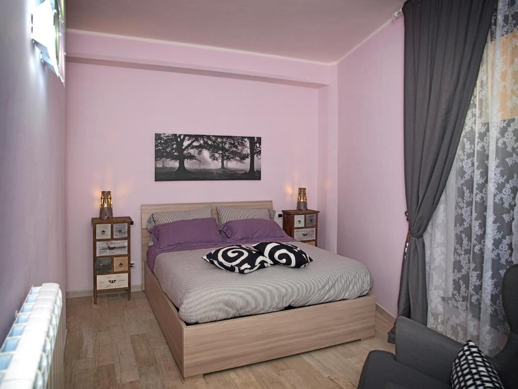 Ένα ή περισσότερα κρεβάτια σε δωμάτιο στο Appartamenti Pistrella