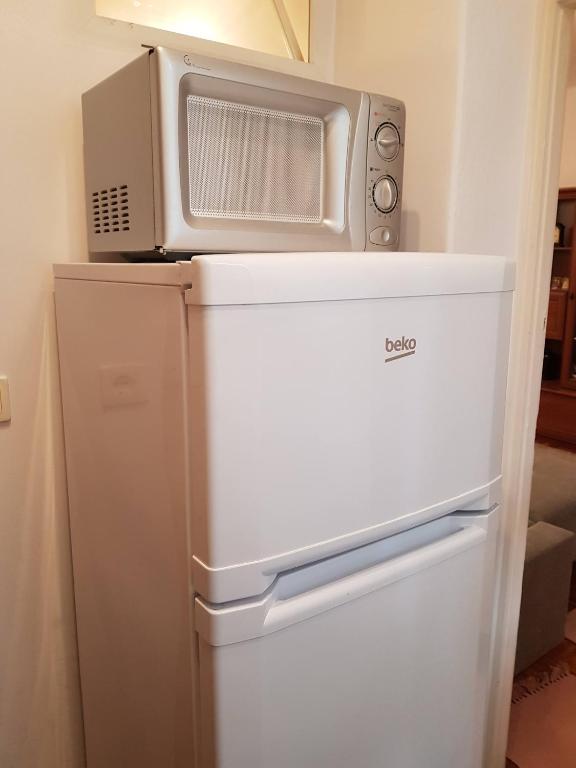 Kuchyňa alebo kuchynka v ubytovaní Rávágy Apartman