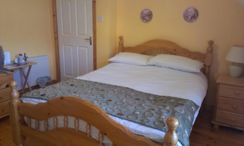 Postel nebo postele na pokoji v ubytování Ethan House B&B