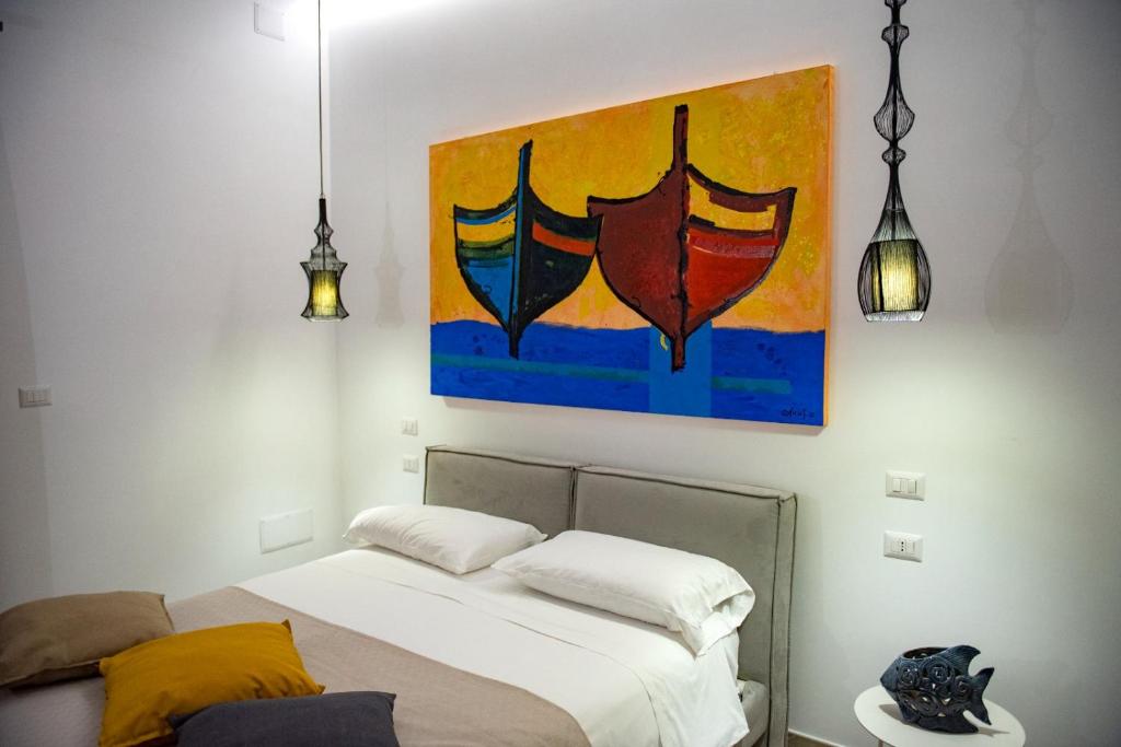 Postel nebo postele na pokoji v ubytování Villa Barone