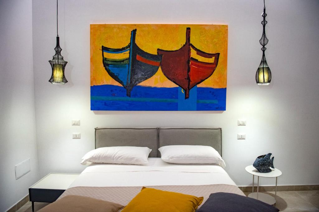 Postel nebo postele na pokoji v ubytování Villa Barone