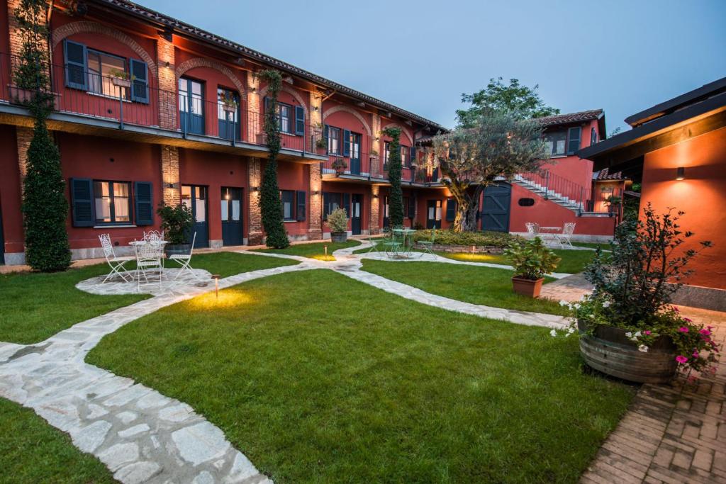 Vonkajšia záhrada v ubytovaní Le Serre Suites & Apartments
