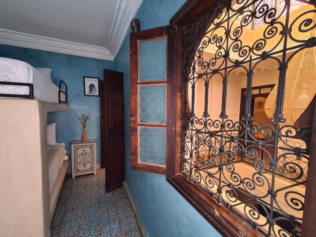 Ein Bett oder Betten in einem Zimmer der Unterkunft Riad Casa Sophia