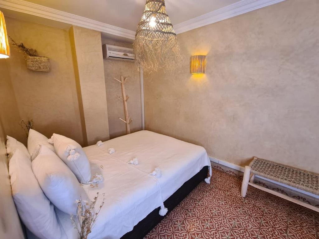 Ein Bett oder Betten in einem Zimmer der Unterkunft Riad Casa Sophia