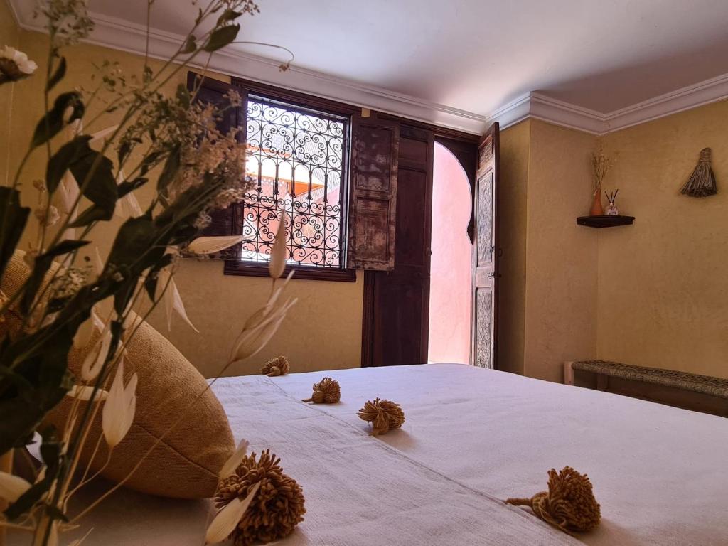 Ein Bett oder Betten in einem Zimmer der Unterkunft Riad Casa Sophia