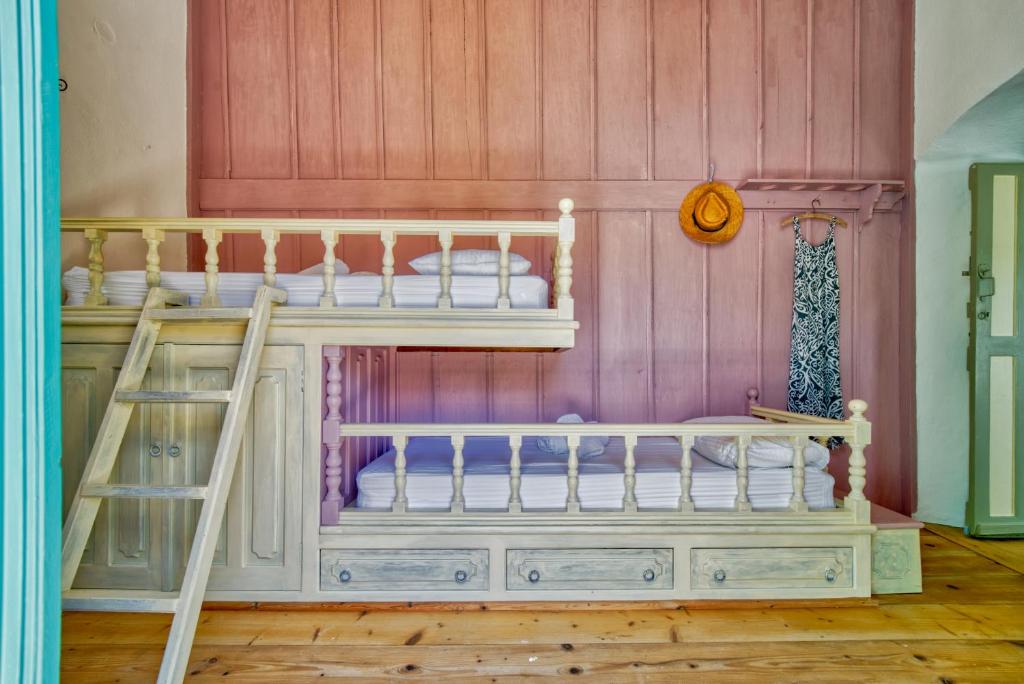 Postel nebo postele na pokoji v ubytování Petridi House