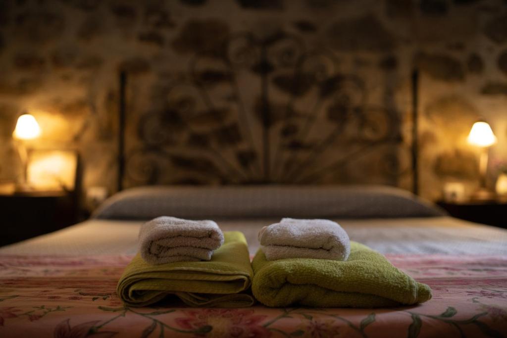 Cama o camas de una habitación en Nidal del Búho Casa Rural