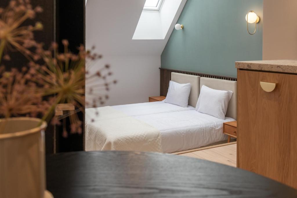 Posteľ alebo postele v izbe v ubytovaní Monciak55 Sopot Apartments