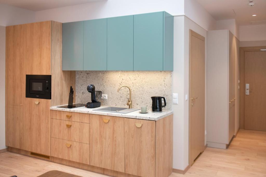 Kuchyňa alebo kuchynka v ubytovaní Monciak55 Sopot Apartments