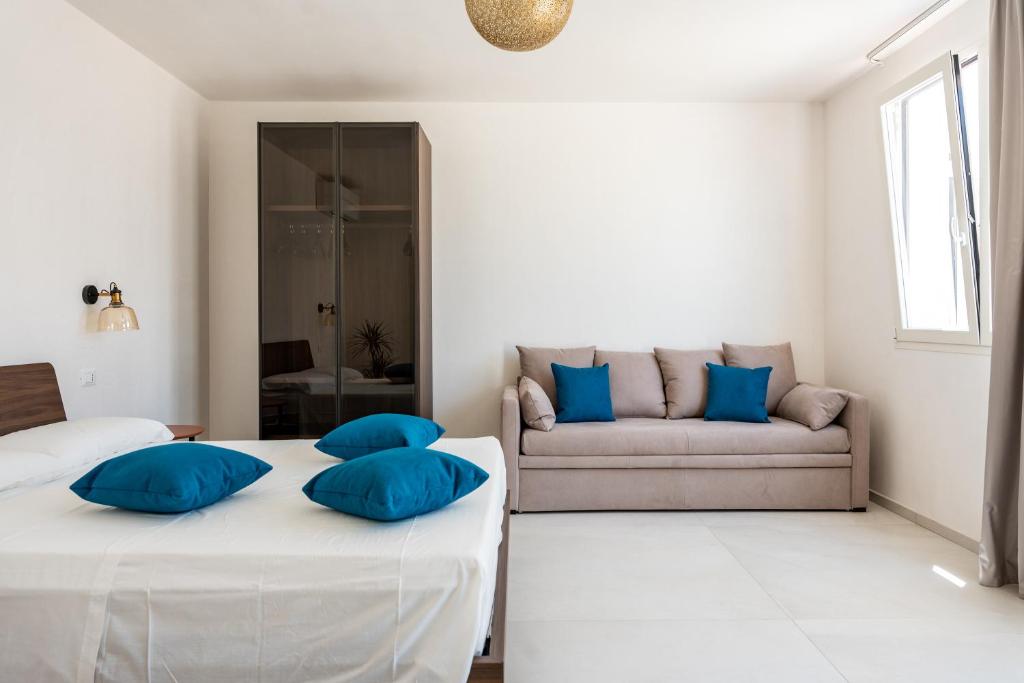 Voodi või voodid majutusasutuse Murieri Rooms toas