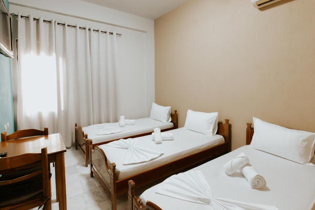 Postel nebo postele na pokoji v ubytování HOTEL LUNXHERIA