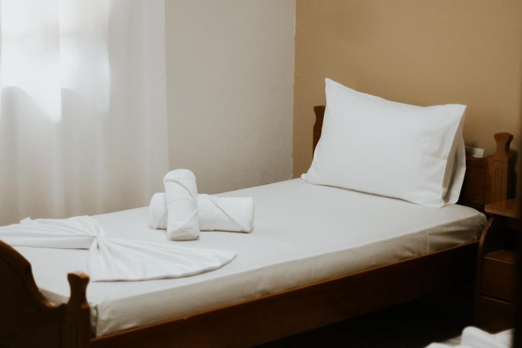 Postel nebo postele na pokoji v ubytování HOTEL LUNXHERIA