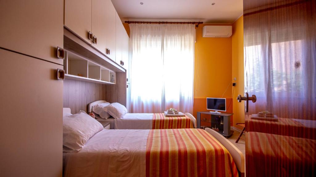 Posteľ alebo postele v izbe v ubytovaní Etna Sunshine Piedimonte