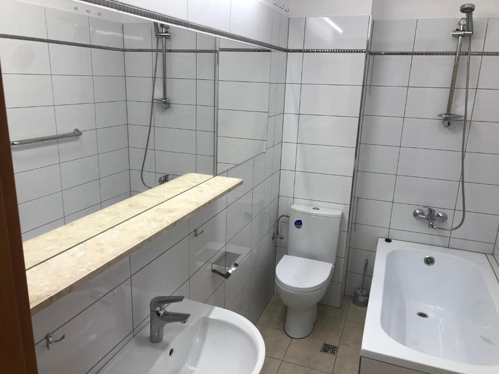 Kúpeľňa v ubytovaní Apartamenty JN Poznań Rzeczna 4
