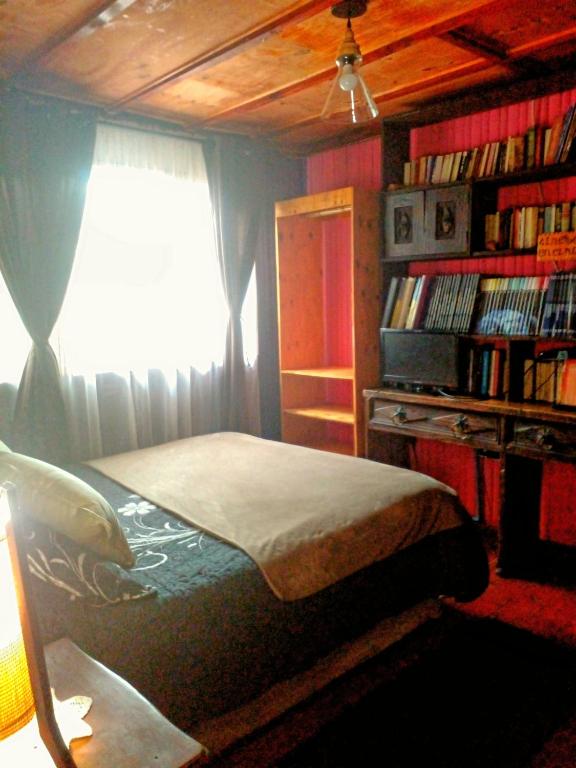 Postel nebo postele na pokoji v ubytování Hostal Casa Galerna de La Montaña