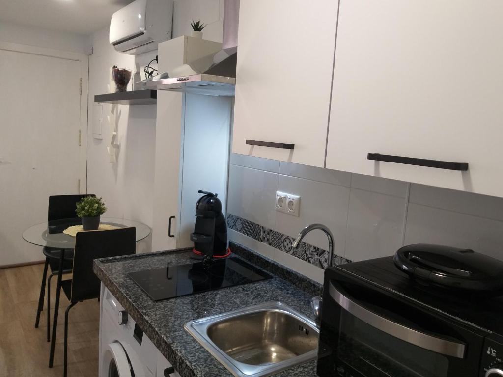 Kuchyňa alebo kuchynka v ubytovaní Victoria Boutique de Torremolinos