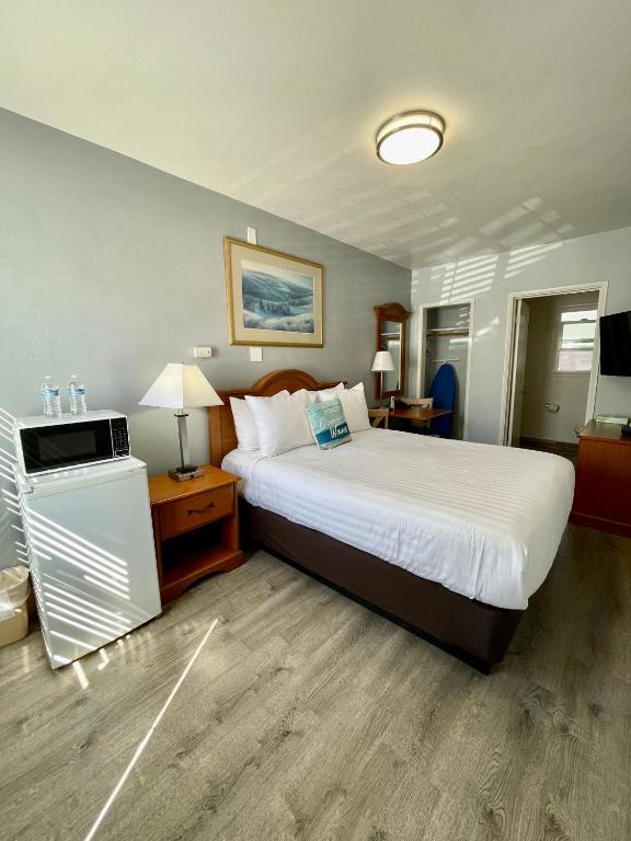 TV a/nebo společenská místnost v ubytování The Palomar Inn