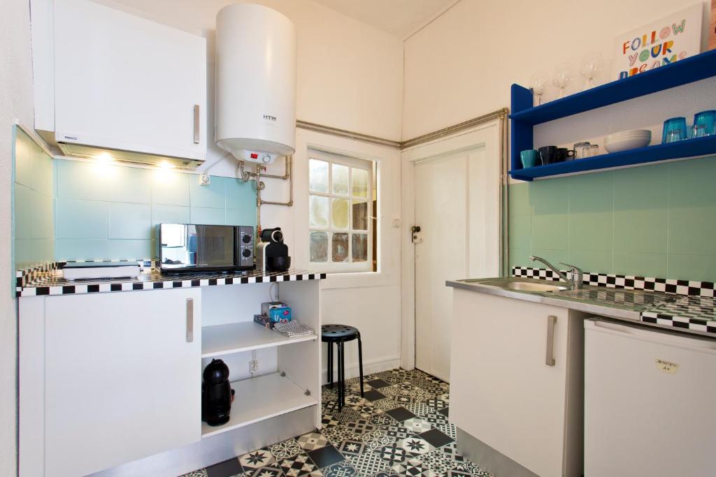 Kuchyň nebo kuchyňský kout v ubytování Oporto Blue Vitória - Lovely Citycenter Studio