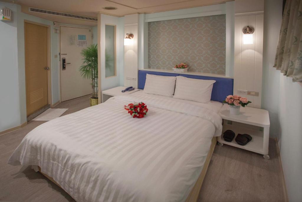 Postel nebo postele na pokoji v ubytování Showart Hotel