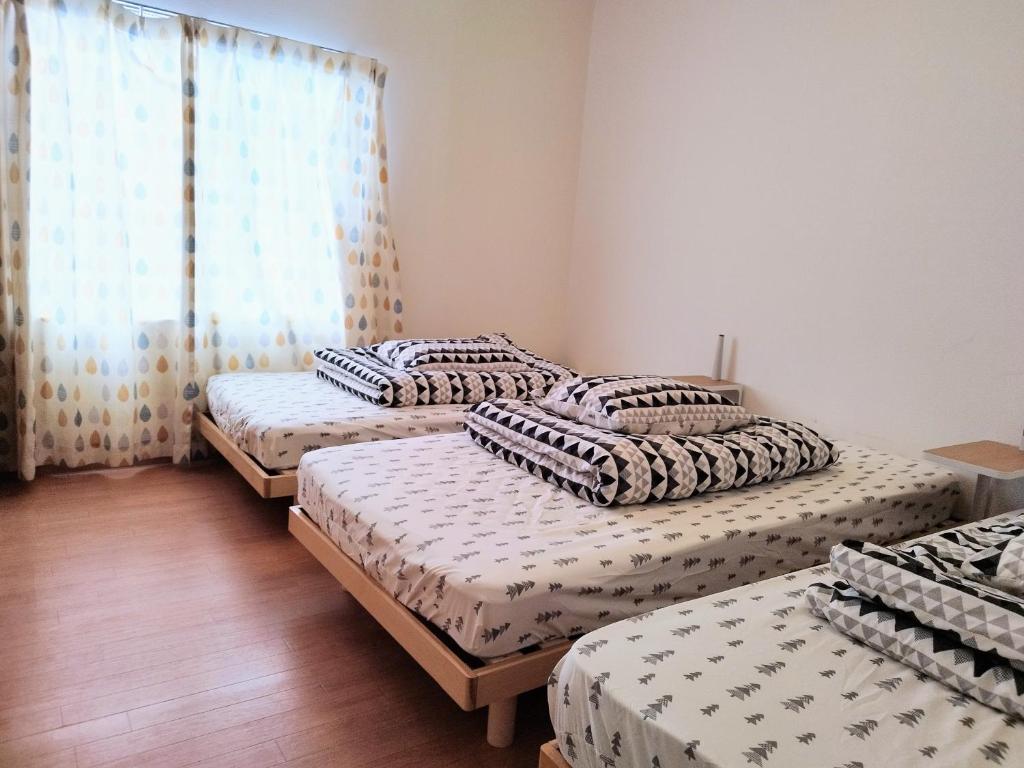 Postel nebo postele na pokoji v ubytování Hachiken Chaya 2F 1-6ppl