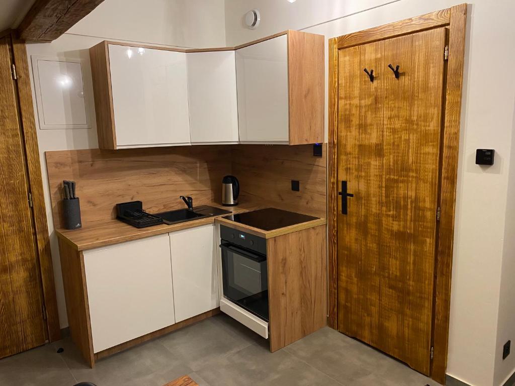 Kuchyňa alebo kuchynka v ubytovaní Apartamenty Zander