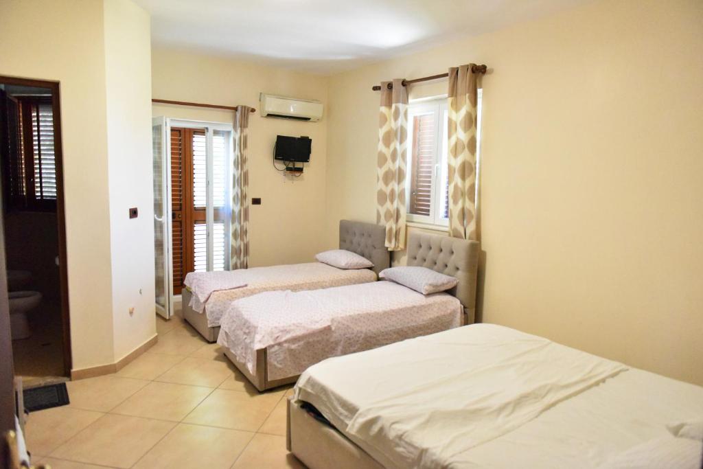 Postel nebo postele na pokoji v ubytování Hotel Freedom
