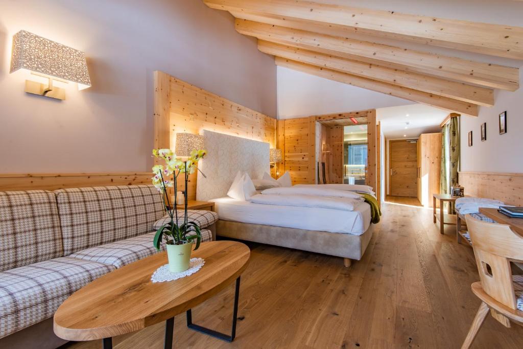 Postel nebo postele na pokoji v ubytování Hotel Cesa Tyrol