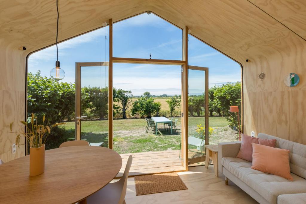 Posezení v ubytování Welcome in - Wikkelhouse, Kon Emmaweg 6 Vrouwenpolder