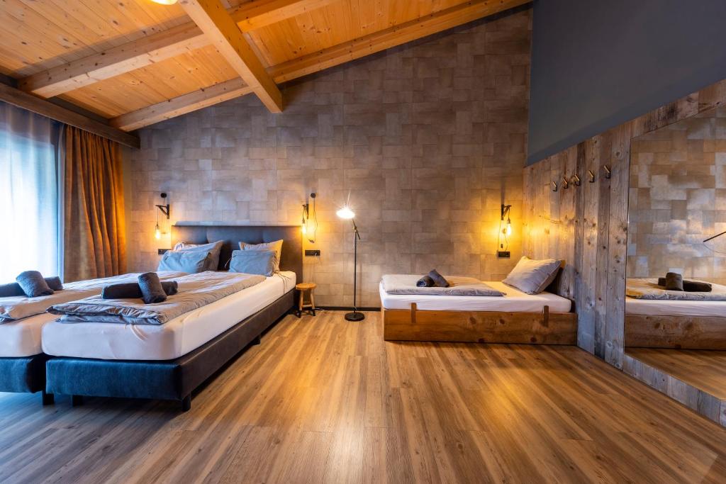 Postel nebo postele na pokoji v ubytování Herz3 Hotel Bar Restaurant Trattoria