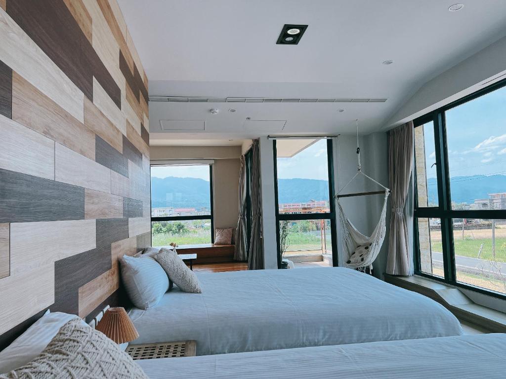 Postel nebo postele na pokoji v ubytování Wei Wei Chu B&B