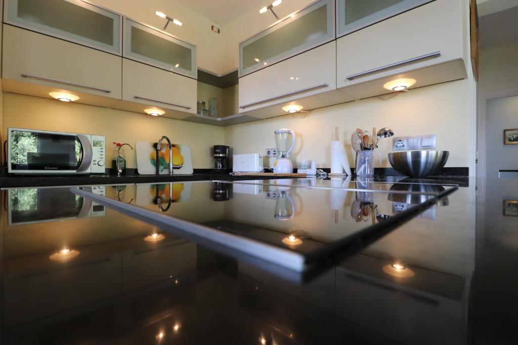 Kuchyň nebo kuchyňský kout v ubytování Casa Home Golf Playa