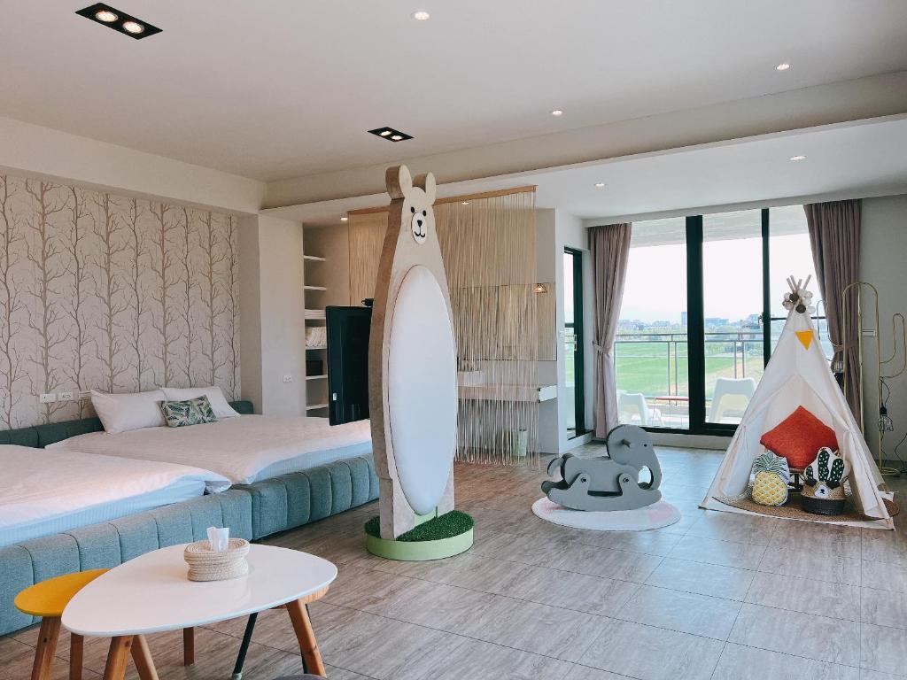Postel nebo postele na pokoji v ubytování Wei Wei Chu B&B