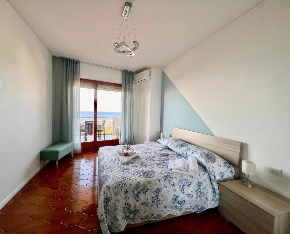 Łóżko lub łóżka w pokoju w obiekcie Special Home VISTA MARE e Parcheggio privato